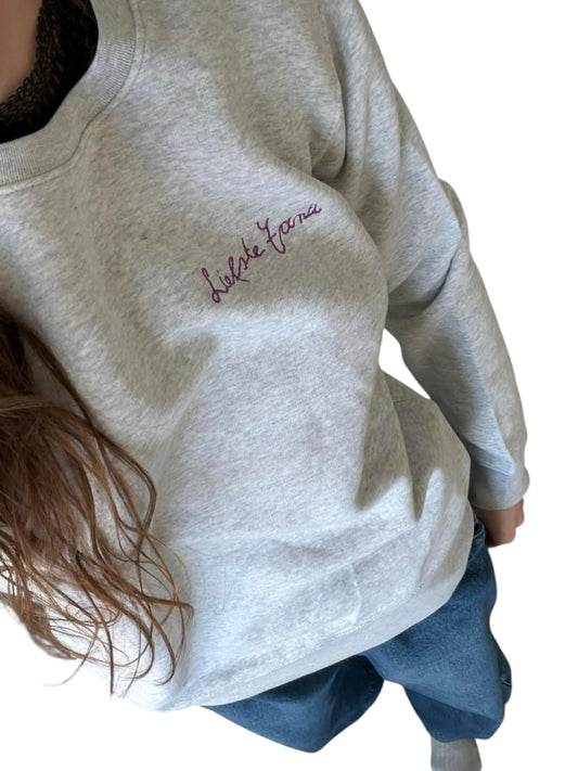 Hoodie met geborduurde tekst